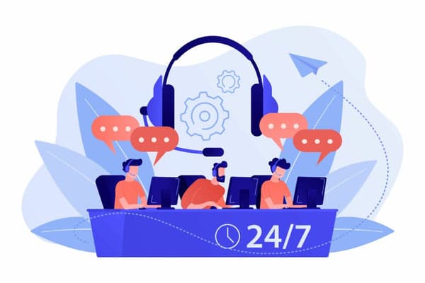 Illustration: Support-Team mit Headsets an einem 24/7-Servicedesk, umgeben von Chat-Sprechblasen